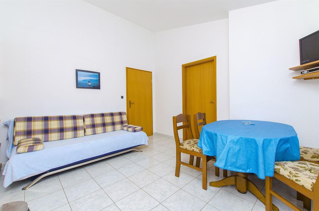 Apartments And Rooms Iva Traù Esterno foto